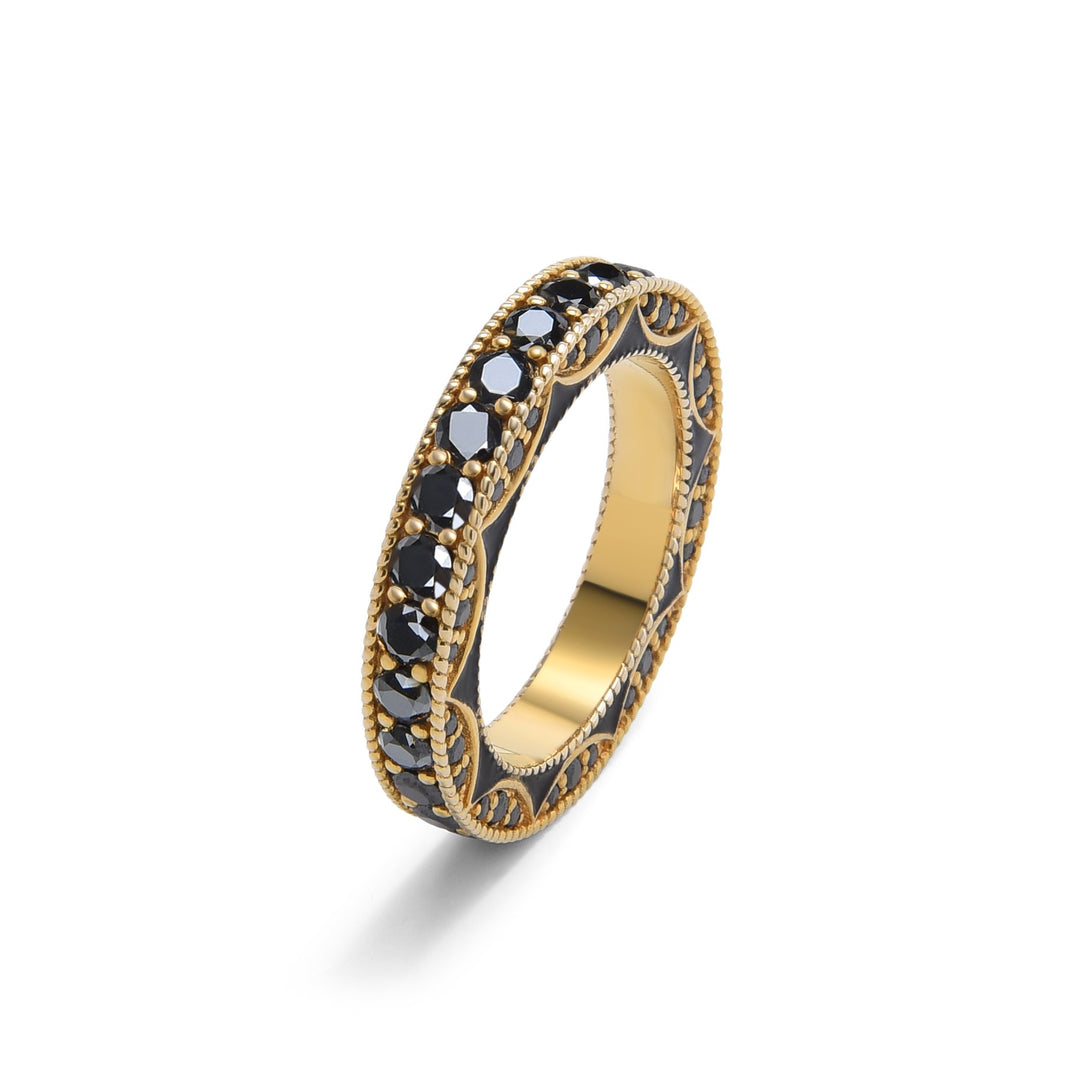 14K gold bulky eternity band featuring black diamonds and intricate goldwork; a luxurious statement piece.