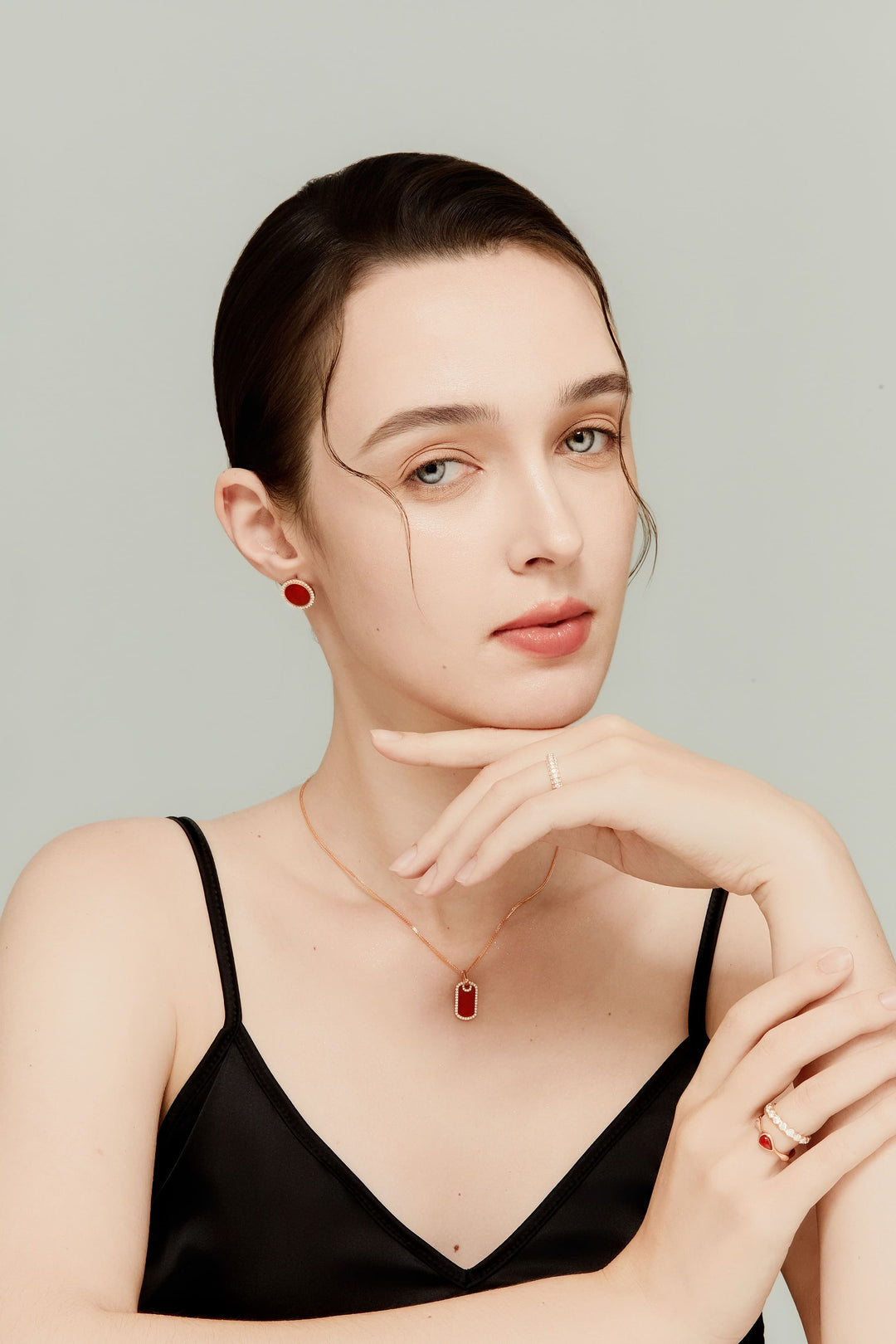 Model wearing the Portal red agate tag pendant necklace