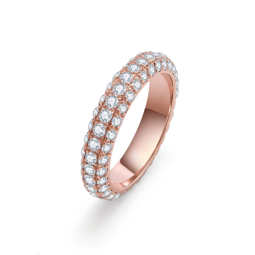 Unisex 14K rose gold eternity band ring set with sustainable lab-grown diamonds in a three-row pavé setting, suitable for men and women.