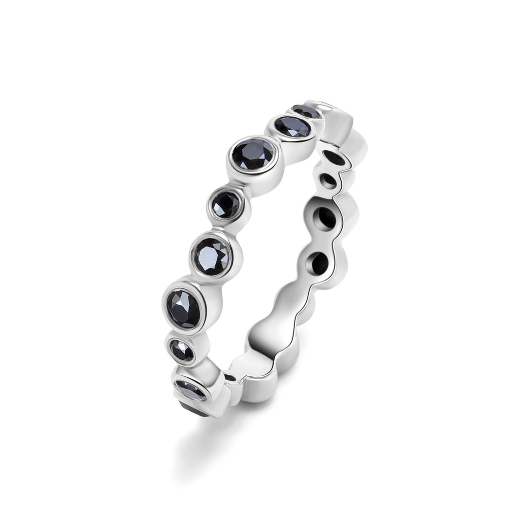 14K white gold bubble eternity ring with bezel-set black diamonds, whimsical and refined.